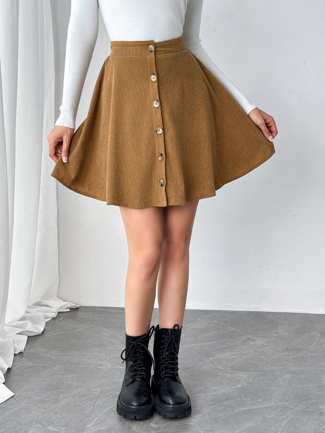 BUTTONED MINI SKIRT