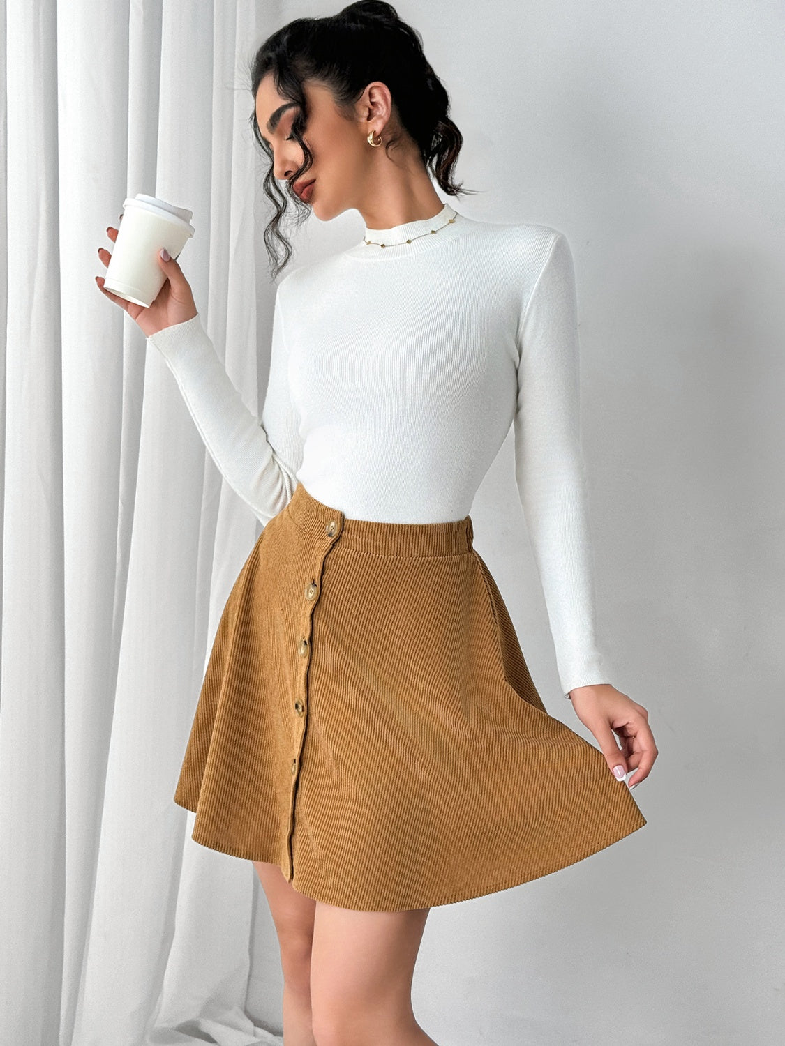 BUTTONED MINI SKIRT