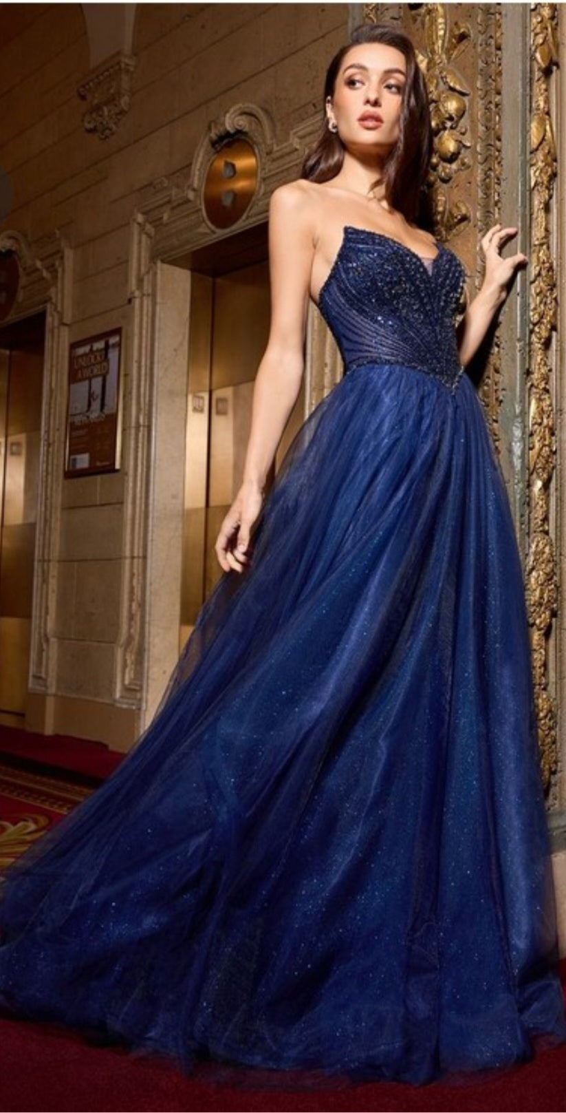 STRAPLESS BEADED TULLE GOWN