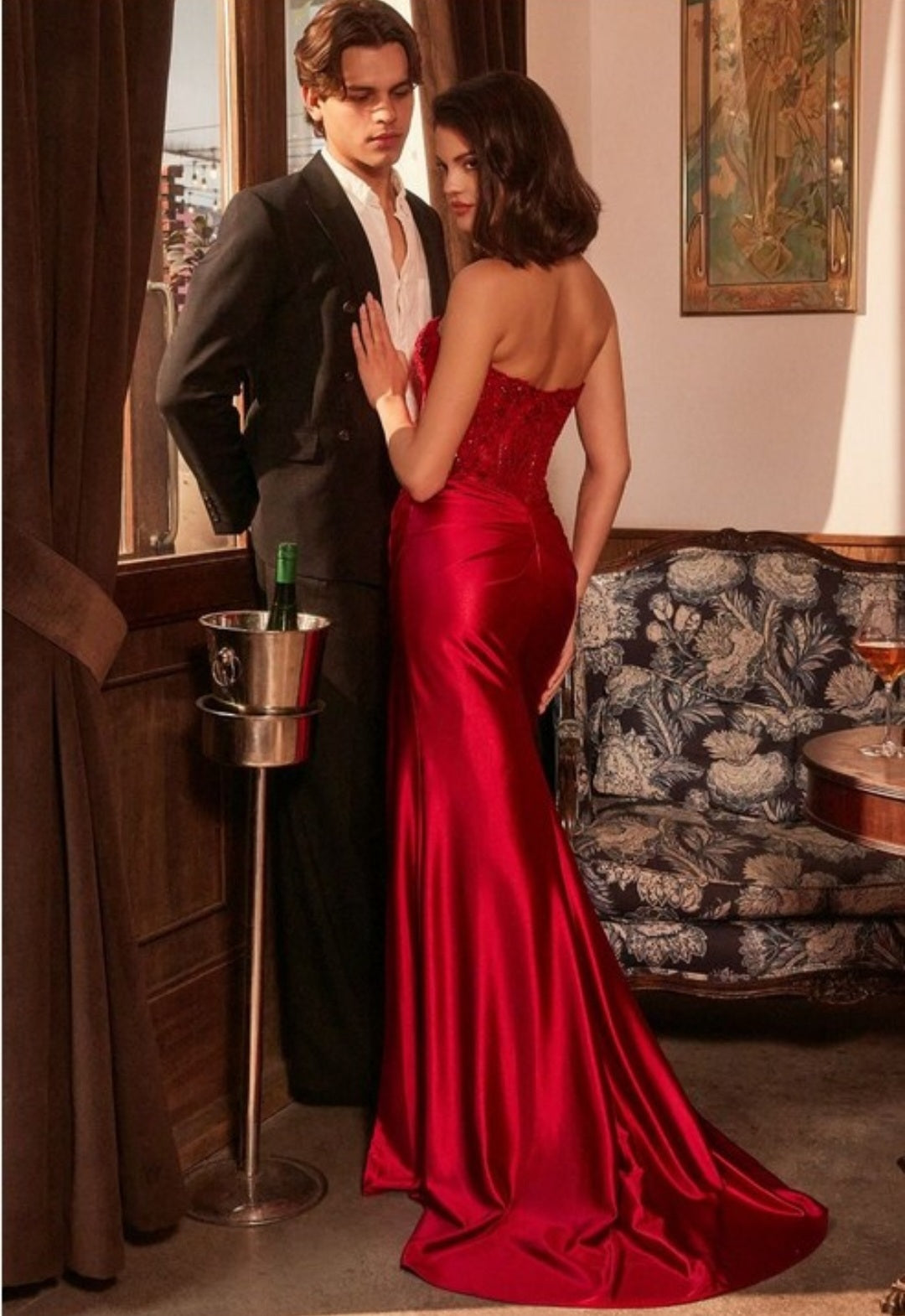 STRAPLESS FITTED SATIN AND LACE GOWN