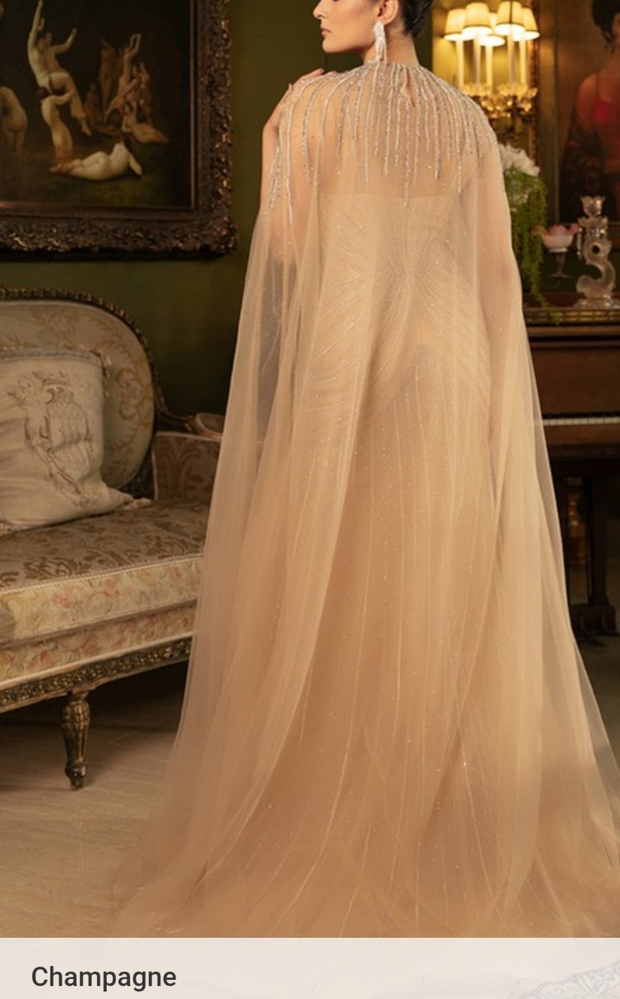 BEADED MERMAID GOWN WITH DRAMATIC CAPE