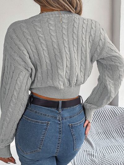 TWISTED CABLE KNIT V NECK SWEATER