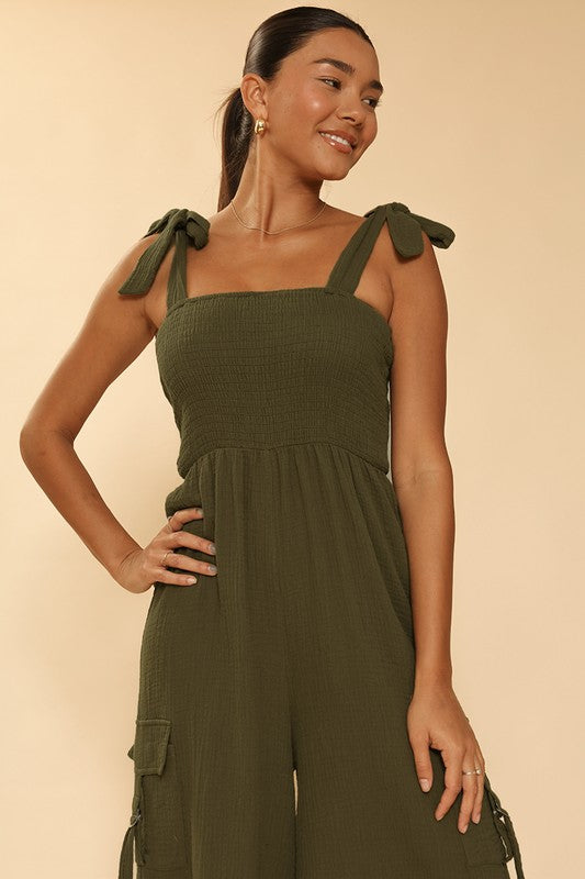 SMOCKED WIDE LEG CARGO JUMPSUIT