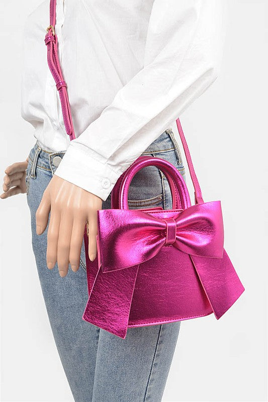 METALLIC BOW TIE TOP HANDLE SWING BAG