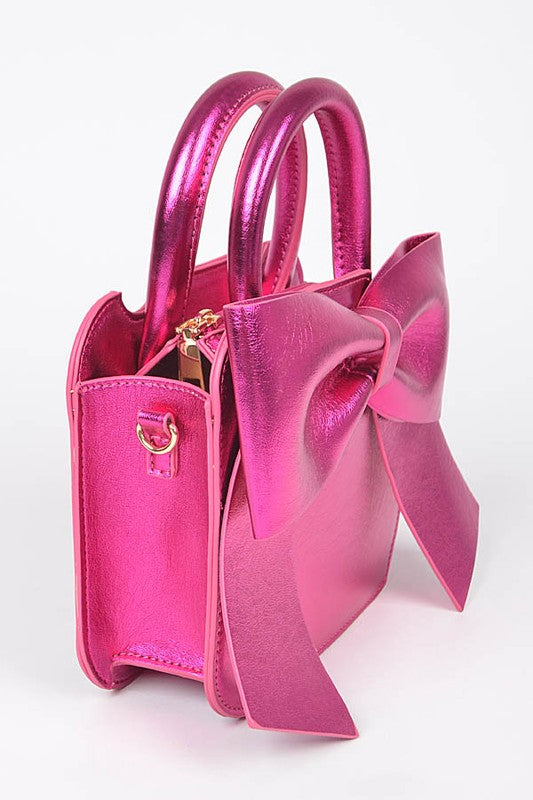 METALLIC BOW TIE TOP HANDLE SWING BAG