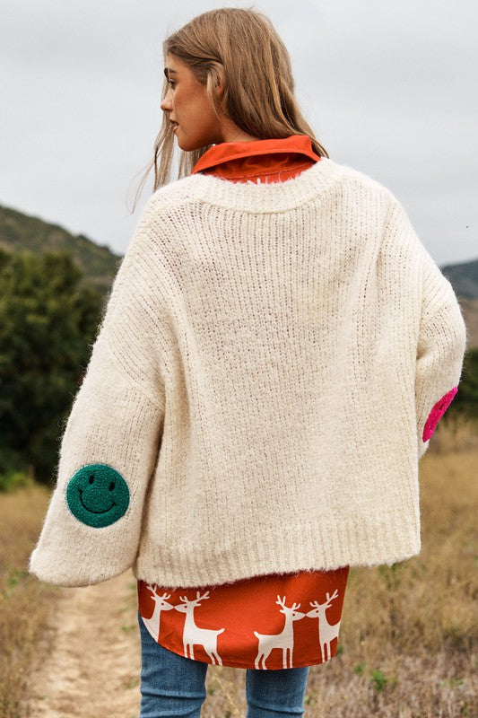 THE FUZZY SMILE LONG BELL SLEEVE KNIT CARIGAN