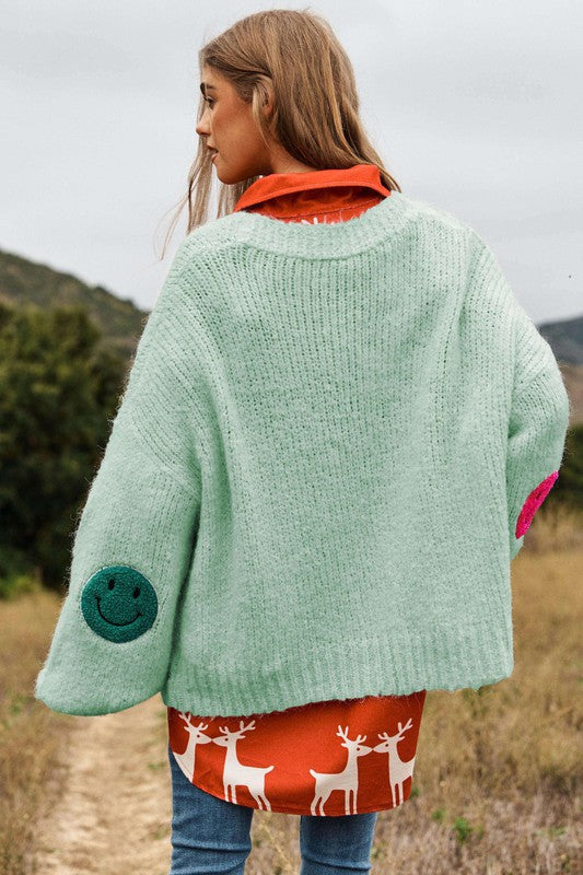 THE FUZZY SMILE LONG BELL SLEEVE KNIT CARIGAN