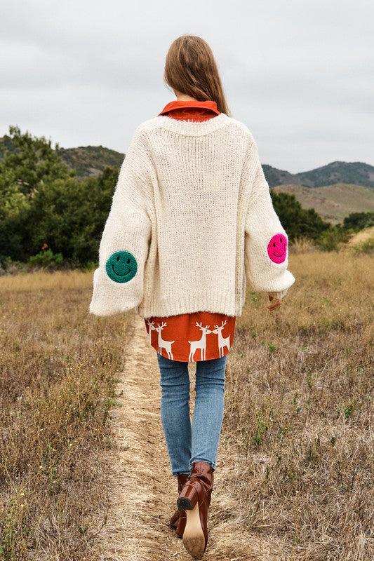 THE FUZZY SMILE LONG BELL SLEEVE KNIT CARIGAN