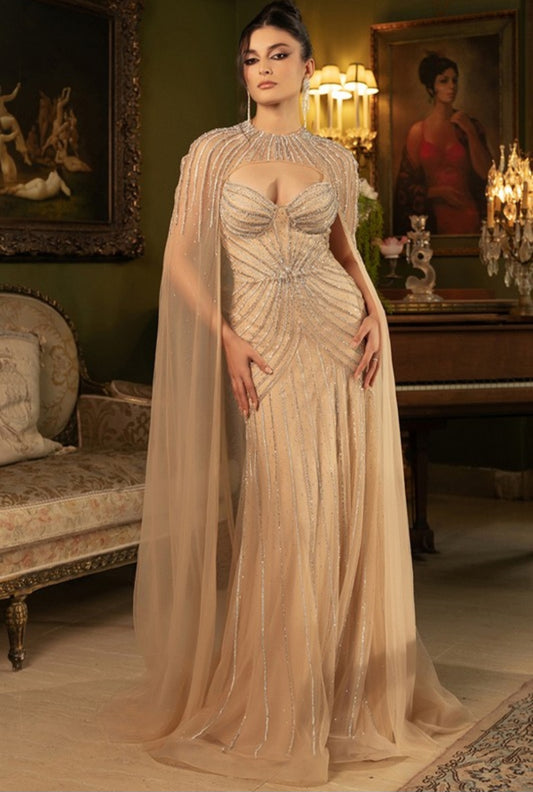 BEADED MERMAID GOWN WITH DRAMATIC CAPE
